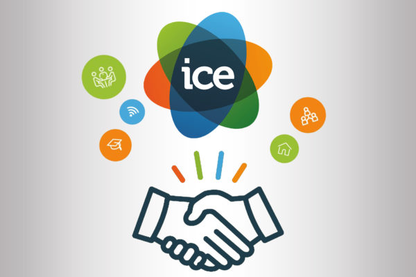 The Welsh ICE Logo above a handshaking symbol.